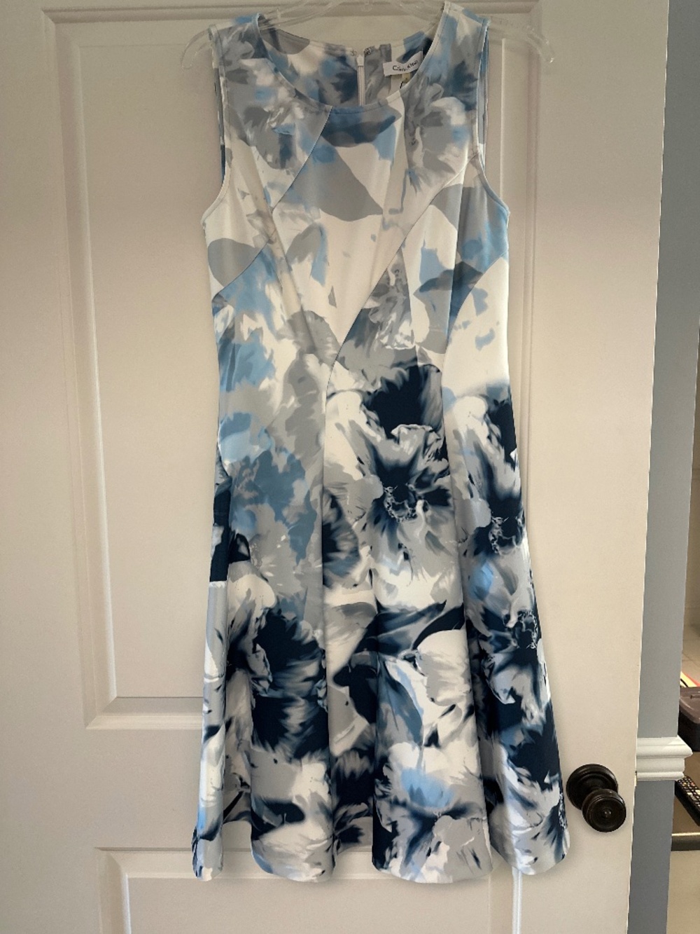 Calvin Klein‘s sleeveless a line dress